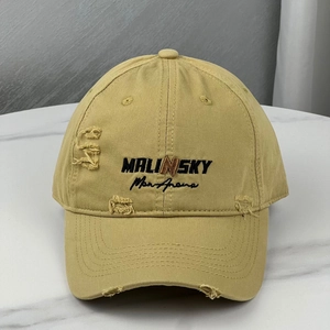 Distressed khaki baseball cap with Malinsky embroidery and vintage torn details