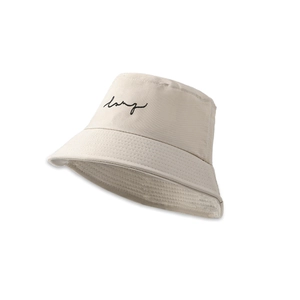 Close-up of beige cotton fisherman hat with black lany letter embroidery on the brim