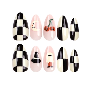 Almond press-on nails with Halloween patterns like pumpkin, moon, and checkerboard design