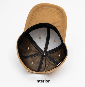 Internal view of faux suede baseball cap featuring black sweatband and 6-panel stitching