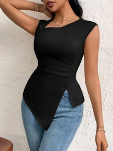 Detail of elegant black slim fit top featuring a unique irregular hem and premium knit fabric