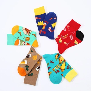 Colorful cotton socks with food patterns like pizza and snacks in a creative circular layout