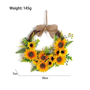 30cm artificial sunflower wreath with yellow blossoms, green leaves and a burlap bow