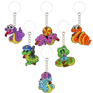 Set of 7 colorful cartoon snake PVC keychains in various cute designs and vibrant colors
