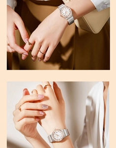 Detailed view of silver ladies watch with diamond bezel and matching luxury rings