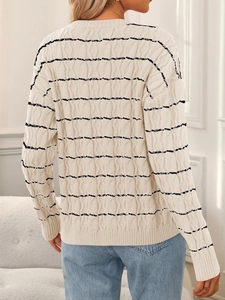 Women's cream oversized cable knit cardigan with black stripes and tie-front waist