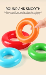 Detail showing smooth rounded plastic rings for baby sensory play without sharp edges