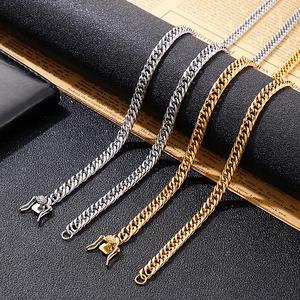Detailed view of 6.5mm gold and silver Cuban chain necklaces with lobster clasps