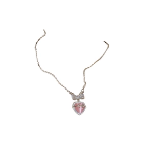 Elegant gold chain necklace with a pink heart pendant and sparkling bow-shaped diamond clasp
