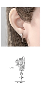 Detail view of silver star earrings with cubic zirconia and 1.7cm by 0.75cm size scale