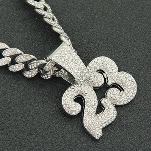 Hip hop silver cuban chain with iced out number 23 pendant featuring sparkling rhinestones