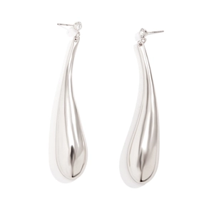 Macro shot of silver teardrop earrings with sparkling crystal studs on a white background