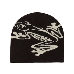 Detail of a black knit beanie featuring a white frog graphic pattern for autumn and winter