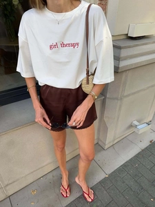 Oversize white T-shirt with girl therapy embroidery and brown silk lace shorts