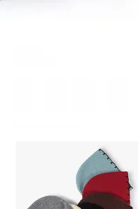 Close-up of thick rib-knit texture and edge stitching on warm winter beanies