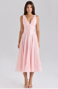 Detailed view of the V-neckline and button-down front on a pink sleeveless midi dress