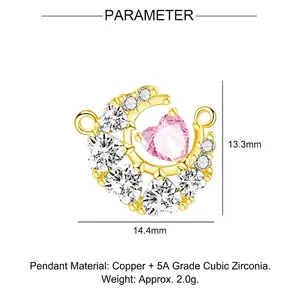 Detail of gold heart moon pendant with pink zircon and dimensions of 14.4mm x 13.3mm