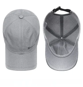 Top and interior detail of a breathable grey mesh baseball cap with adjustable strap