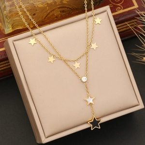 Elegant gold-plated double layer star necklace featuring cubic zirconia and star charms