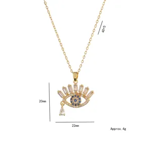 Golden evil eye necklace with blue zircon pendant on a minimalist stainless steel chain
