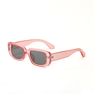 Retro square sunglasses with transparent pink frame and black lenses in a 45-degree view