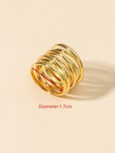 Detailed close-up showing 1.7cm diameter measurement for golden multi-layer spring ring