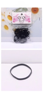 Detail showing high-elasticity black hair band with a maximum stretch of 50cm