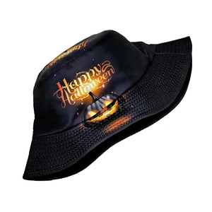 Detail of black Halloween bucket hat featuring orange Jack-o'-lantern and festive print