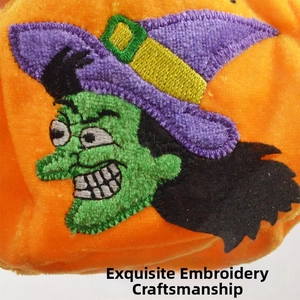 Close-up of Halloween orange plush bag featuring detailed green witch portrait embroidery