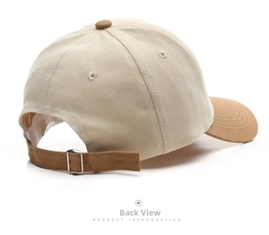Detailed back view of a beige baseball cap with brown brim and metal adjustment buckle