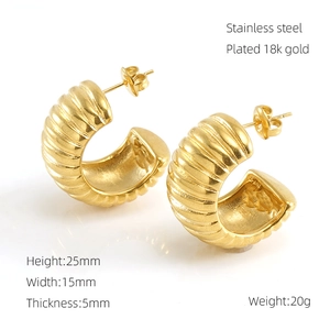 Detailed view of 18k gold plated C-shaped earrings with texture and dimensions specs