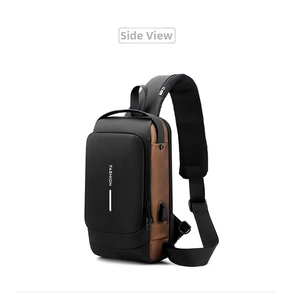 Detail of waterproof men's sling bag showing USB charging port and reflective strip