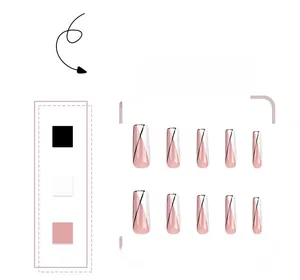 Detailed close-up of French tip press-on nails with minimalist black lines and white blocks