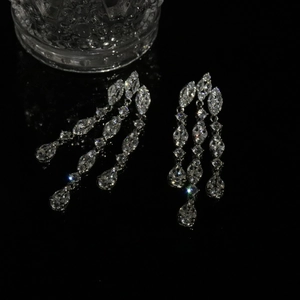 Silver zircon tassel earrings with oval drop design for elegant luxury fashion style
