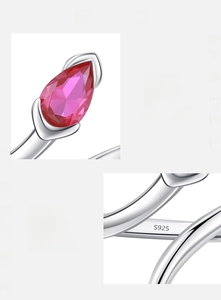 Macro detail of S925 sterling silver ring showing 5A red zircon and hallmark stamp