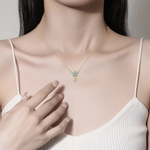 Elegant S925 silver flower necklace with blue petals and zircon stones on a model