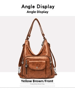 Front view of yellow-brown soft leather shoulder bag with multiple zipper pockets