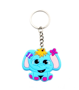 Detail of cute blue PVC elephant keychain with pink bow and silver metal keyring