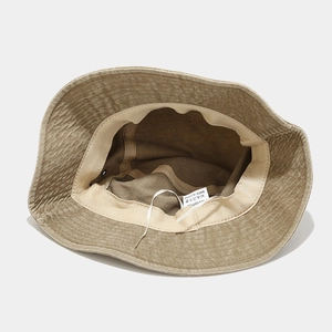 Washed canvas bucket hat in sand beige with internal adjustable strap and sweatband