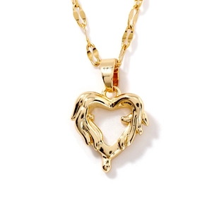 Minimalist gold heart pendant necklace with artistic fluid lava texture on white background