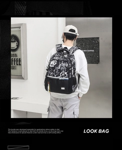 Detail of street-style graffiti backpack featuring anti-slip chest buckle and nylon texture