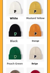 Detail view of colorful knit beanies with contrasting P letter embroidery patches