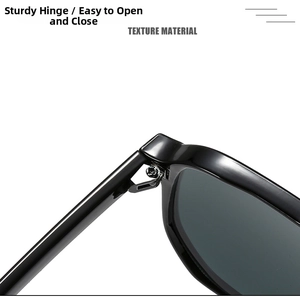 Macro view of a sturdy metal hinge on glossy black oversized square sunglasses frames