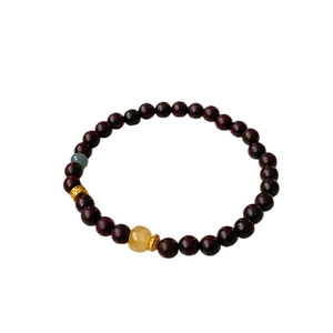 Vintage sandalwood bead bracelet with amber and blue crystal in a new Chinese style