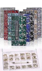 Detailed set of mixed 21-grid nail art rhinestones with dual-ended dotting pen tool