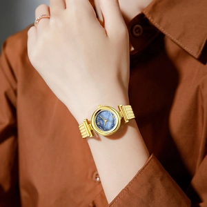 Elegant GEDI women quartz watch with gold mesh strap and blue mother of pearl dial