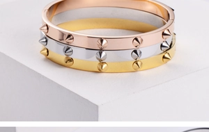 Three-color titanium steel nail bracelets in gold, silver, and rose gold finishes