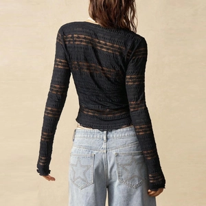 Back view of a black sheer lace long sleeve top with mesh stripes and slim fit style