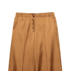 Women's brown satin wide-leg trousers featuring a button fly and smooth glossy finish
