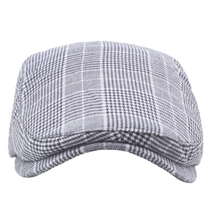 Casquette plate classique grise de style newsboy britannique avec motif pied-de-poule